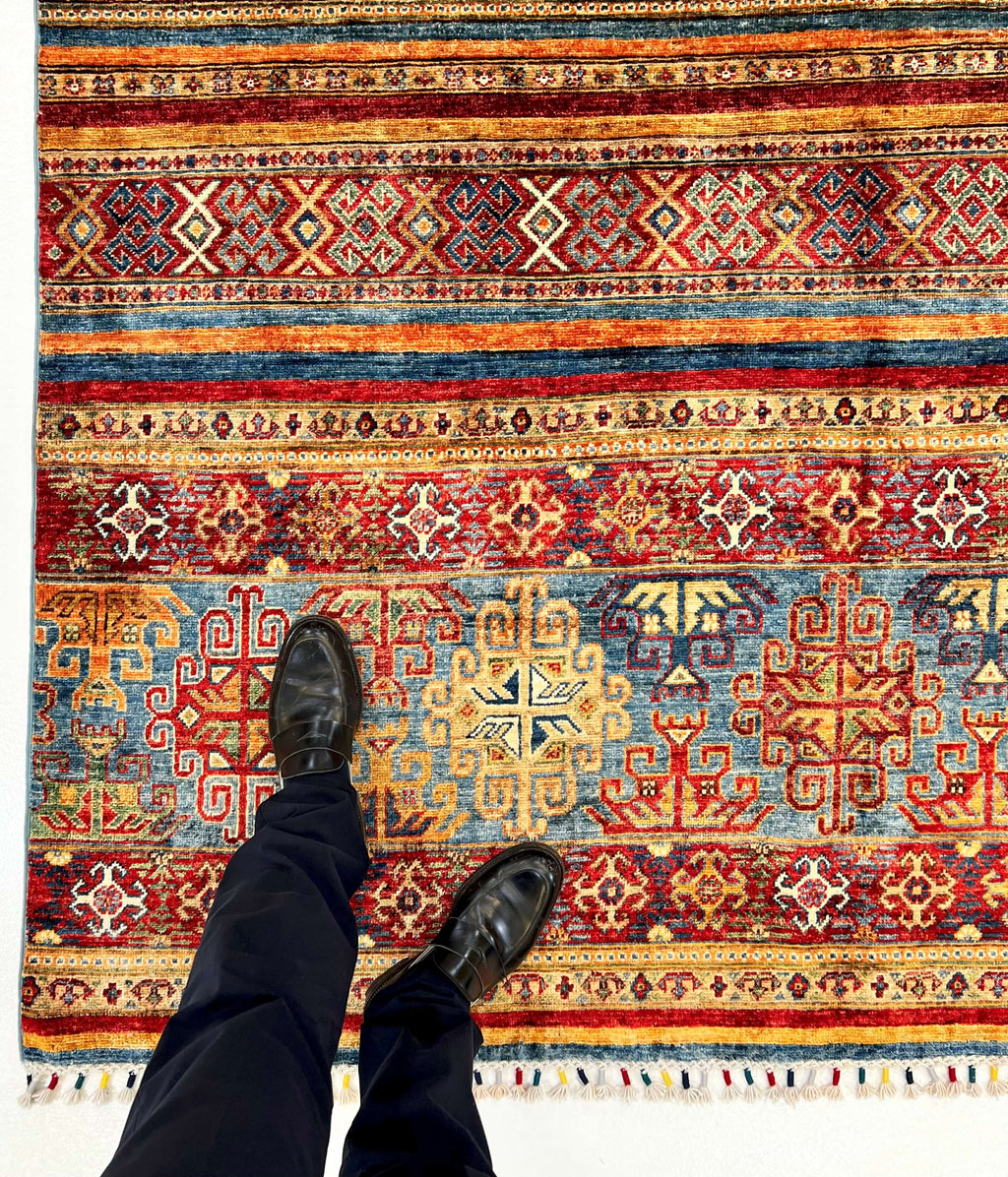 Khorjin (6'01"x8'07") blue/mulitcolor