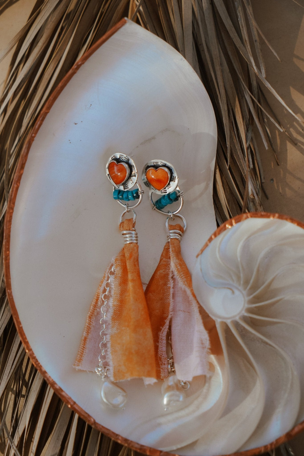 Earrings in Spiny Oyster Hearts and pearl beads