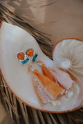 Earrings in Spiny Oyster Hearts and pearl beads