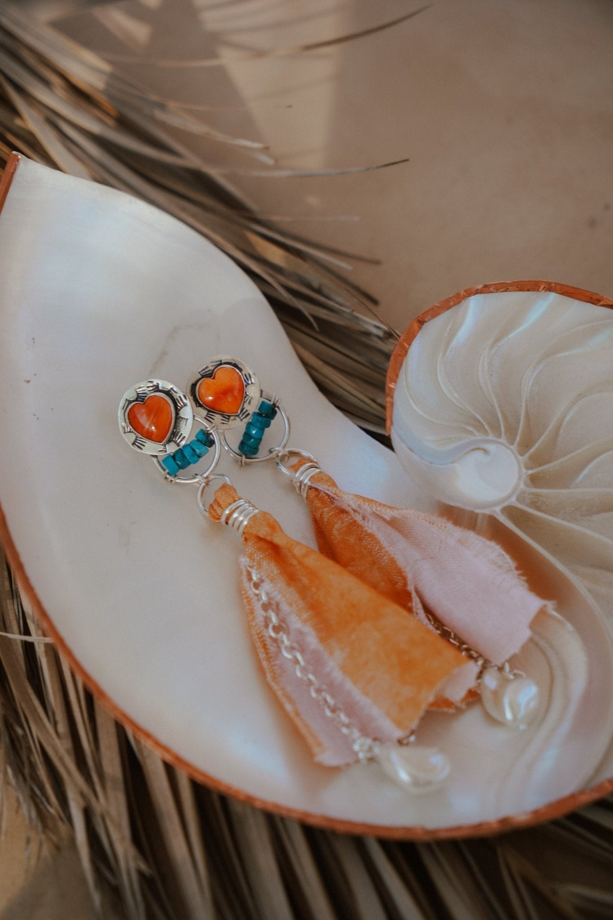 Earrings in Spiny Oyster Hearts and pearl beads