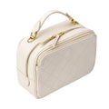 Ivory Quilted Leather Camera Bag with Top Handle and Crossbody Strap