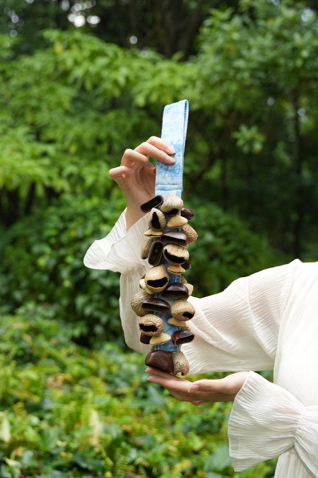 "The Blue Tide Rattle" - Handheld Seed Shaker with Blue Batik Strap