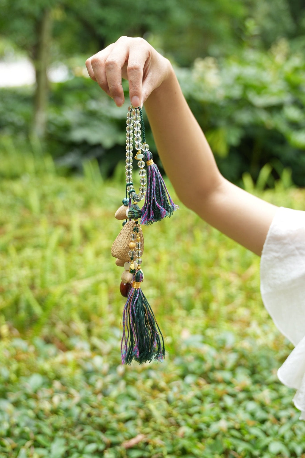 "The Crystal Harmony Tassel" - Natural Seed Charm with Crystal Beads & Silk Tassels