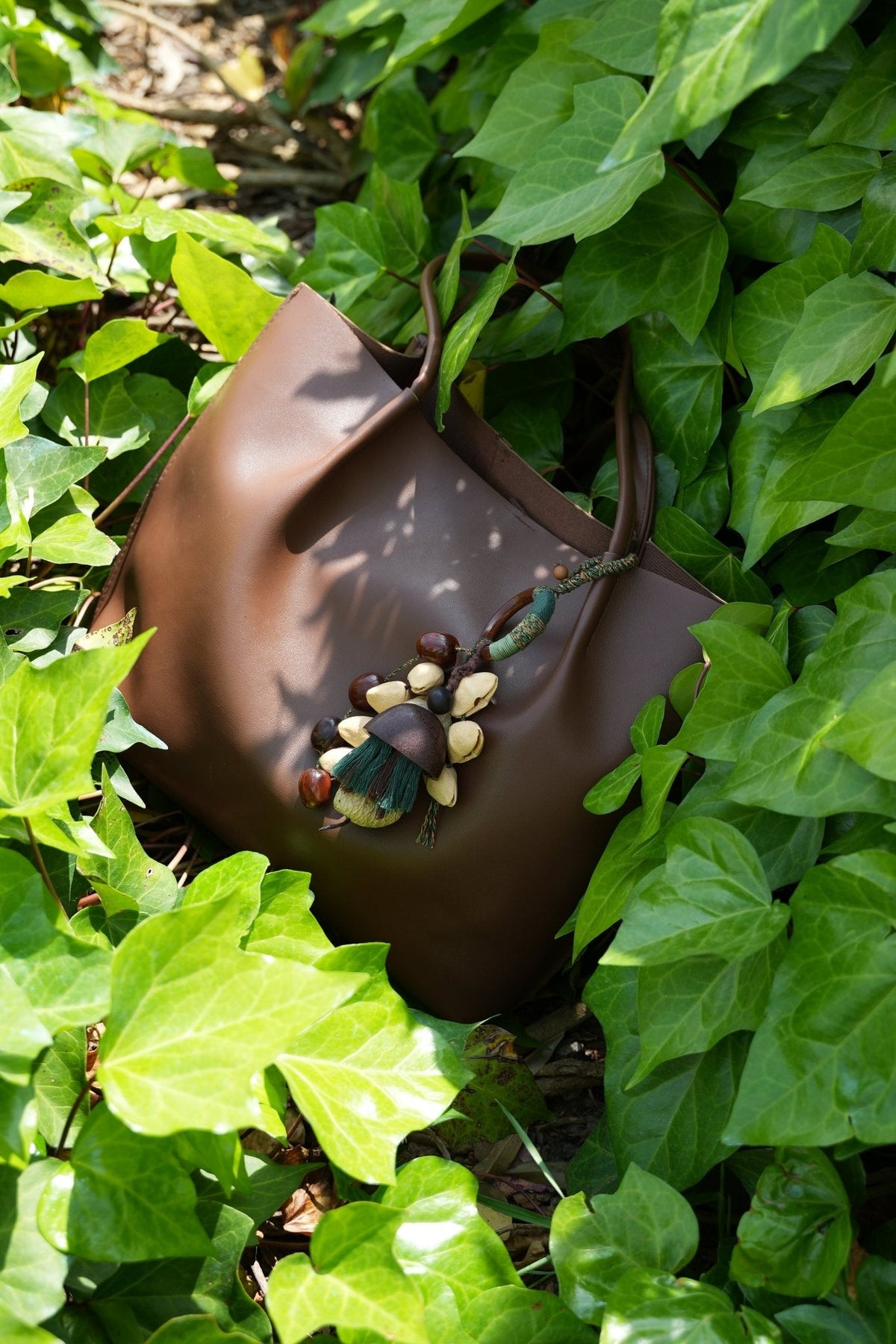 "The Forest Harvest" - Cascading Nut Shell & Green Tassel Bag Charm