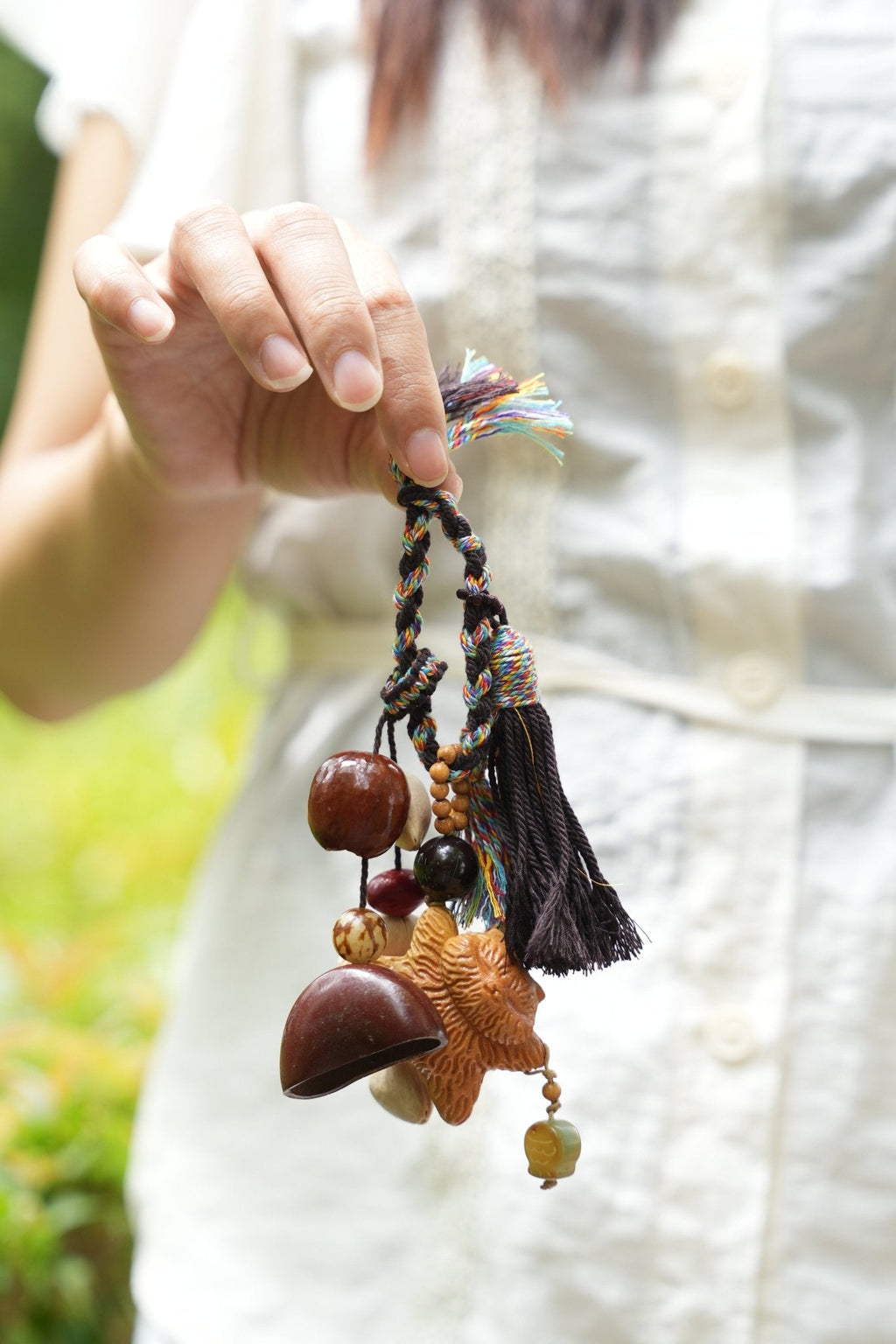 "The Guardian Lion" - Hand-Carved Wood Bag Charm with Tassel & Seed Bell