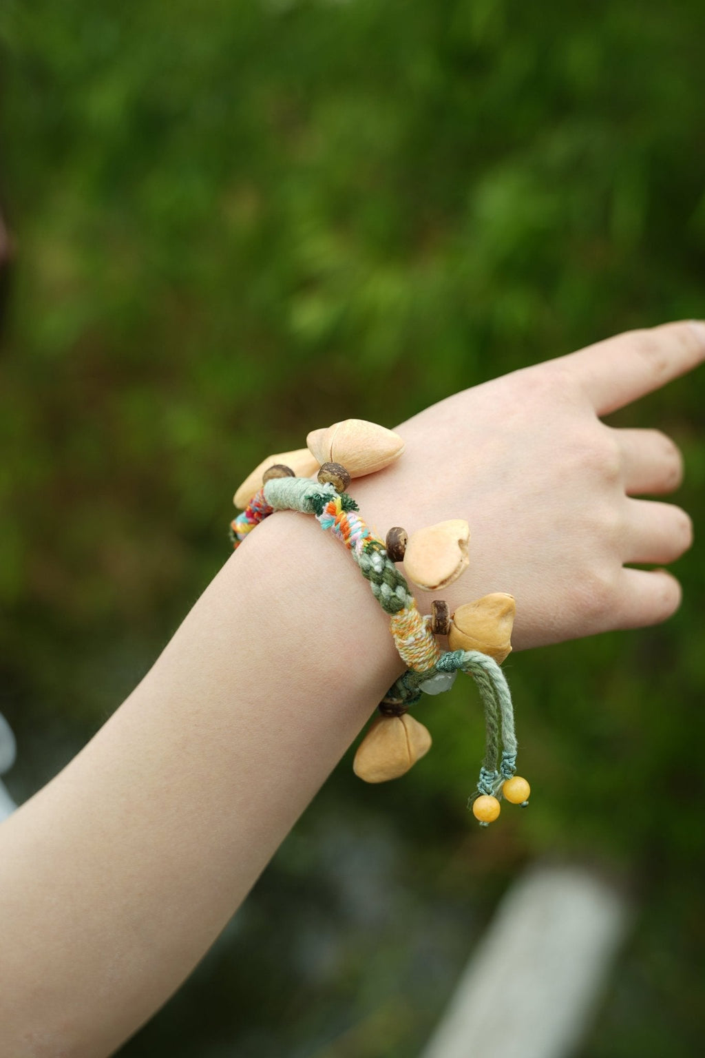 "The Happy Pistachio" - Hand-Braided Natural Shell Bracelet with Colorful Cord