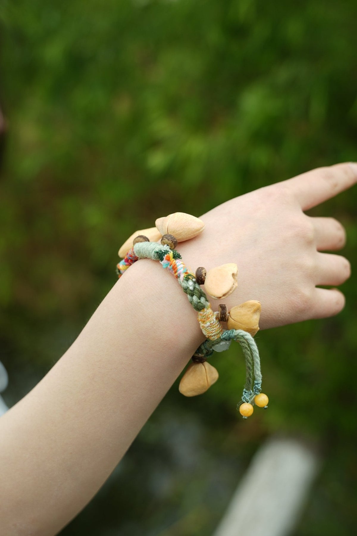 "The Happy Pistachio" - Hand-Braided Natural Shell Bracelet with Colorful Cord