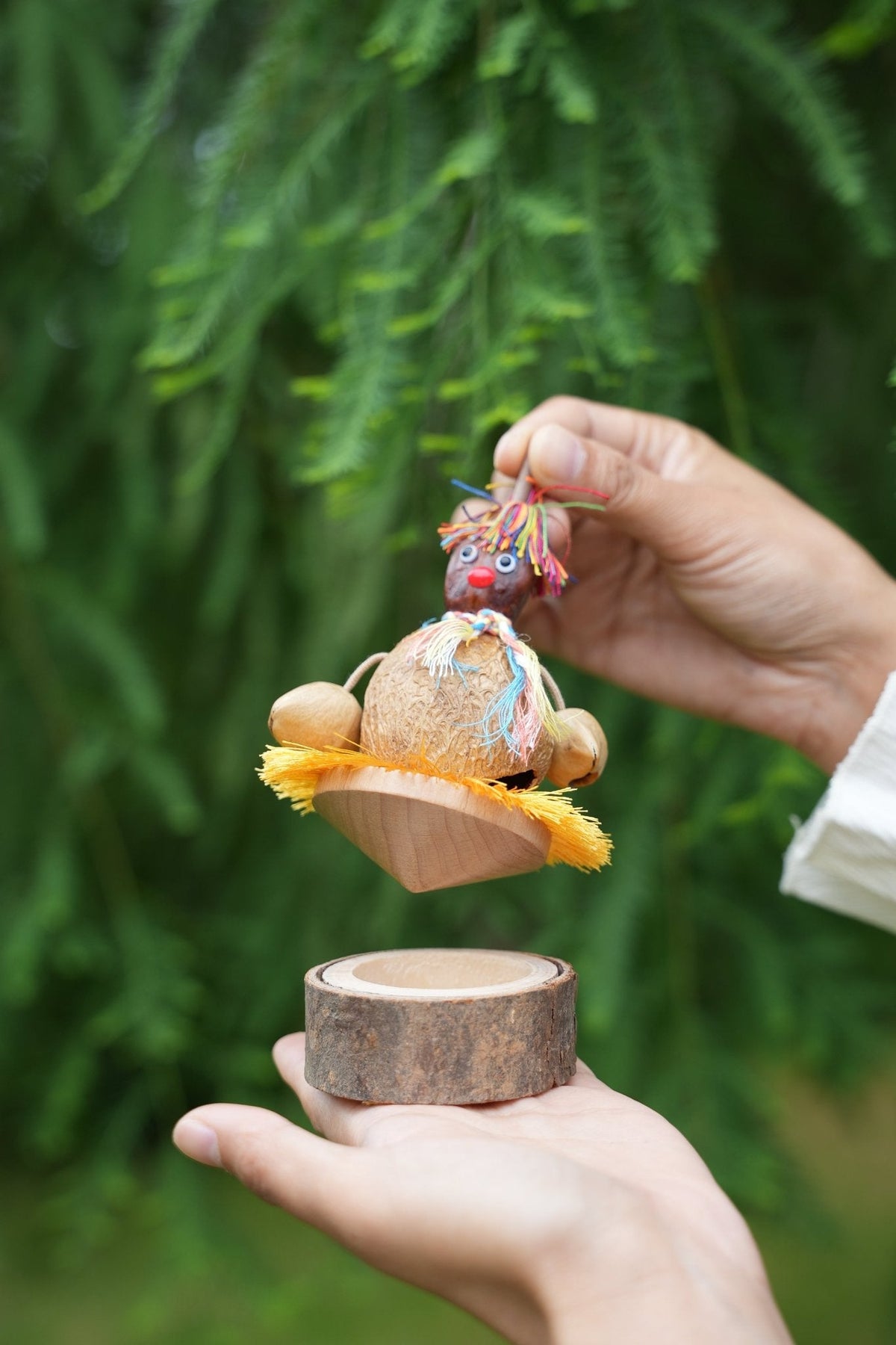 "The Hula Dancer" - Handcrafted Coconut Shell Spinning Top Toy with Log Base