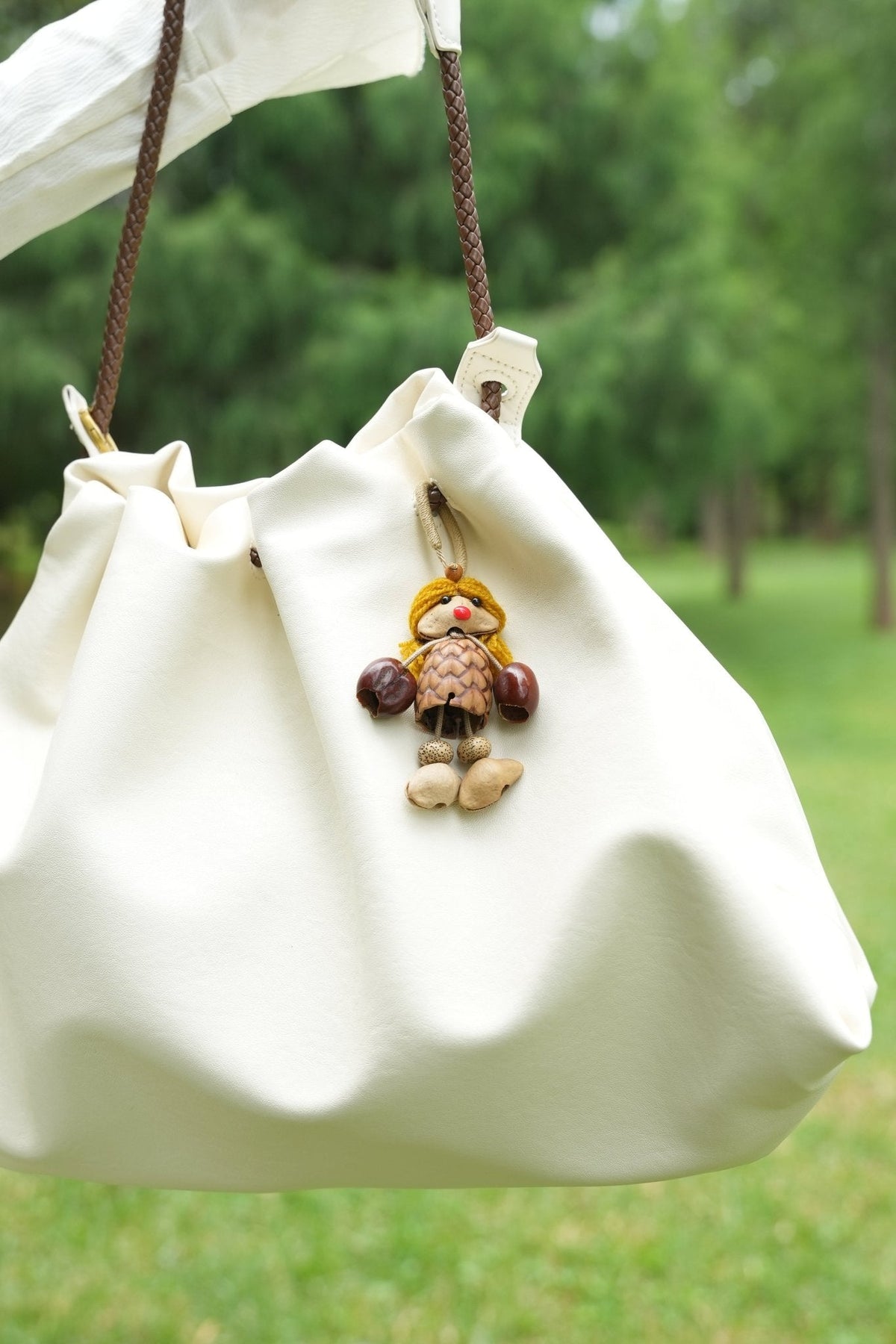 "The Pinecone Pixie" - Handcrafted Nut Shell Doll Bag Charm with Yarn Hair