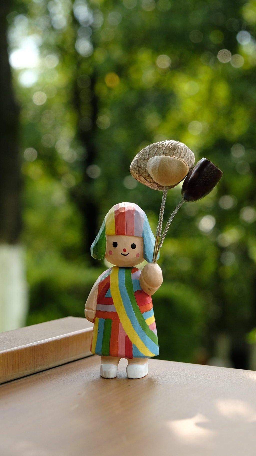 "The Rainbow Girl" - Hand-Carved Wooden Figure with Real Seed Balloons