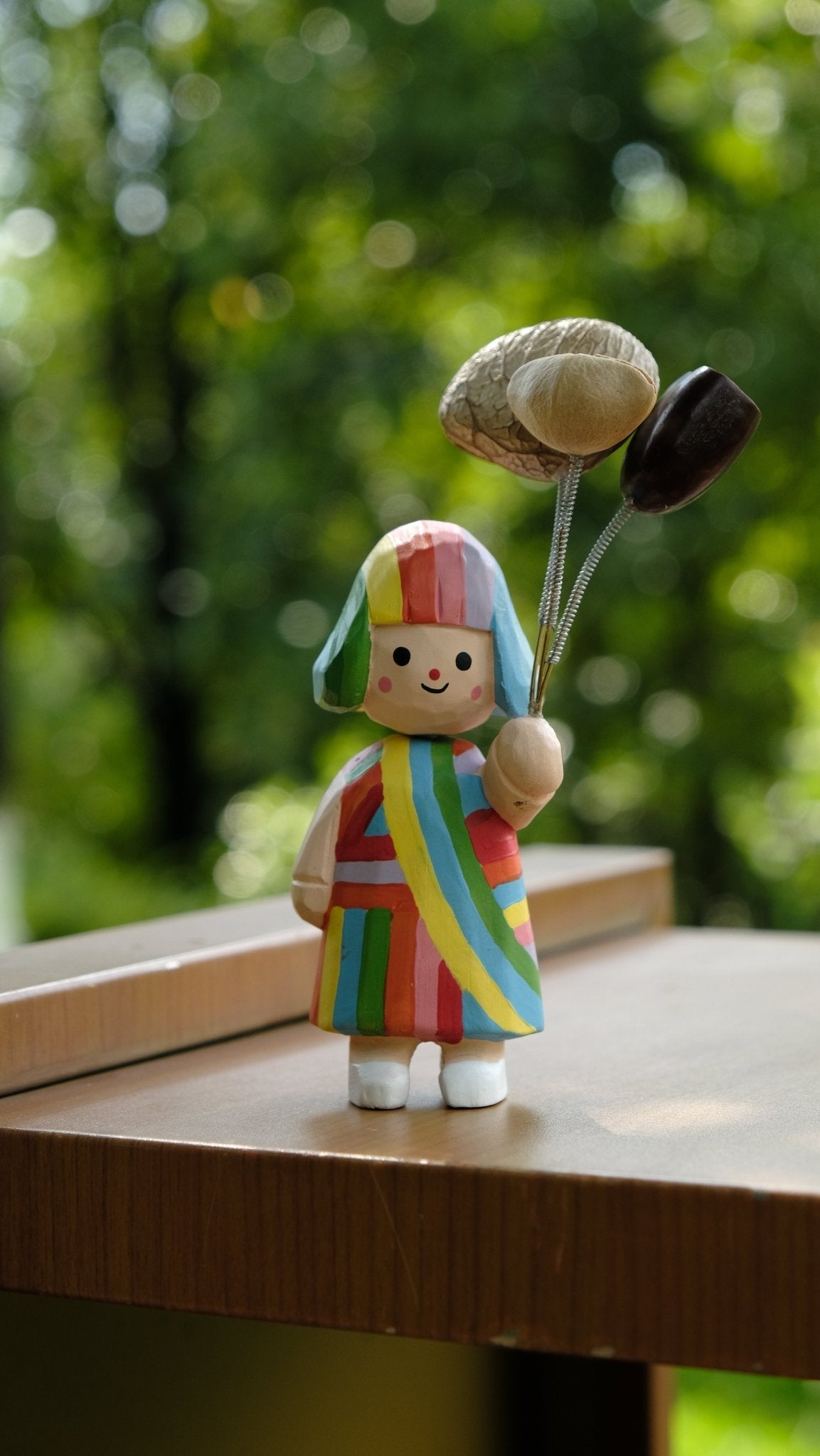 "The Rainbow Girl" - Hand-Carved Wooden Figure with Real Seed Balloons