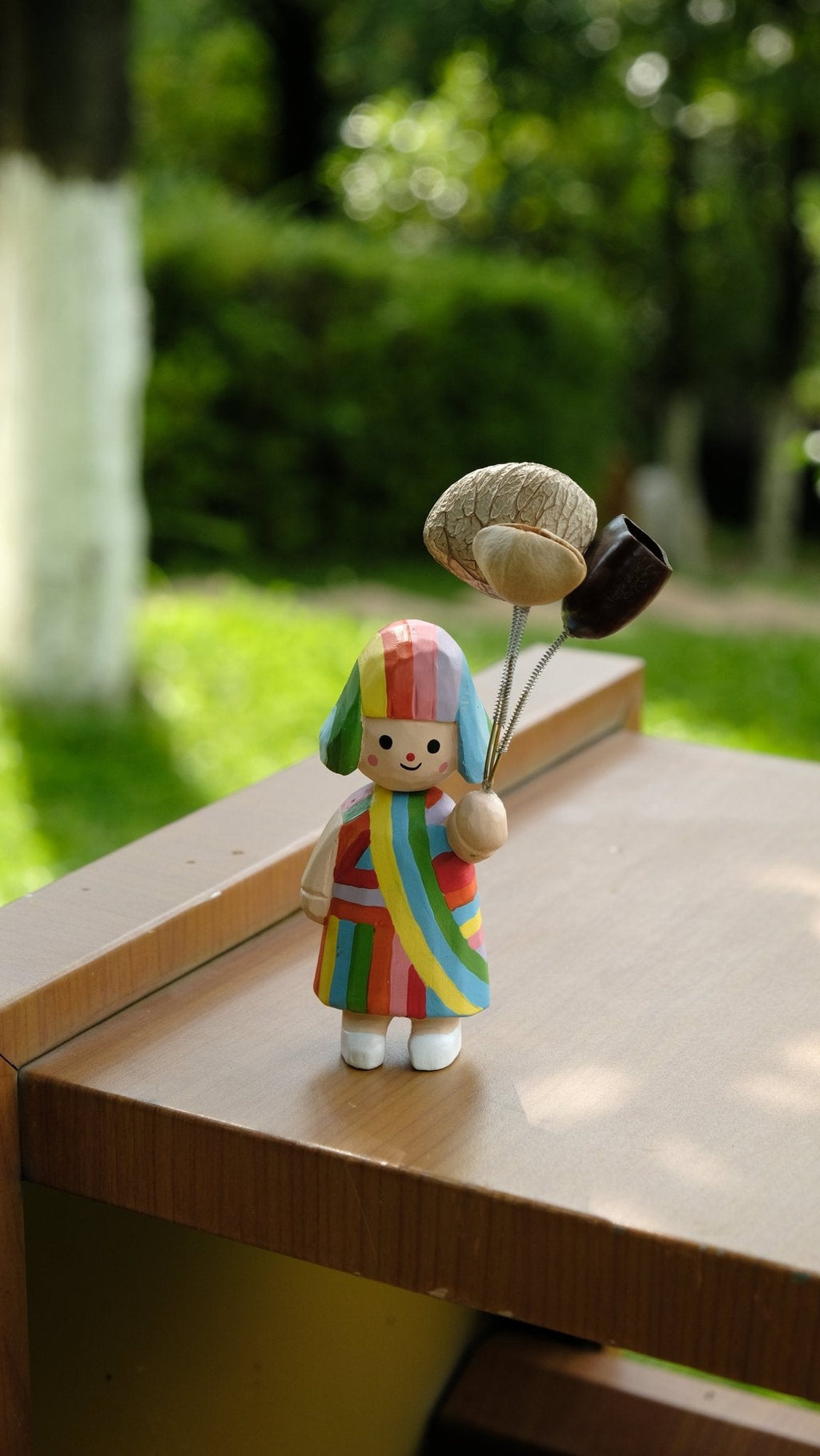 "The Rainbow Girl" - Hand-Carved Wooden Figure with Real Seed Balloons