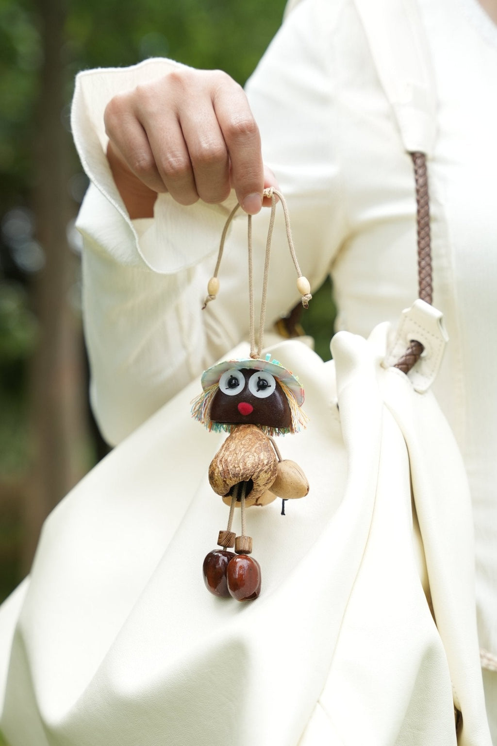 "The Seed Sprite" - Handcrafted Nut Shell Doll Charm with Colorful Fringe Hair