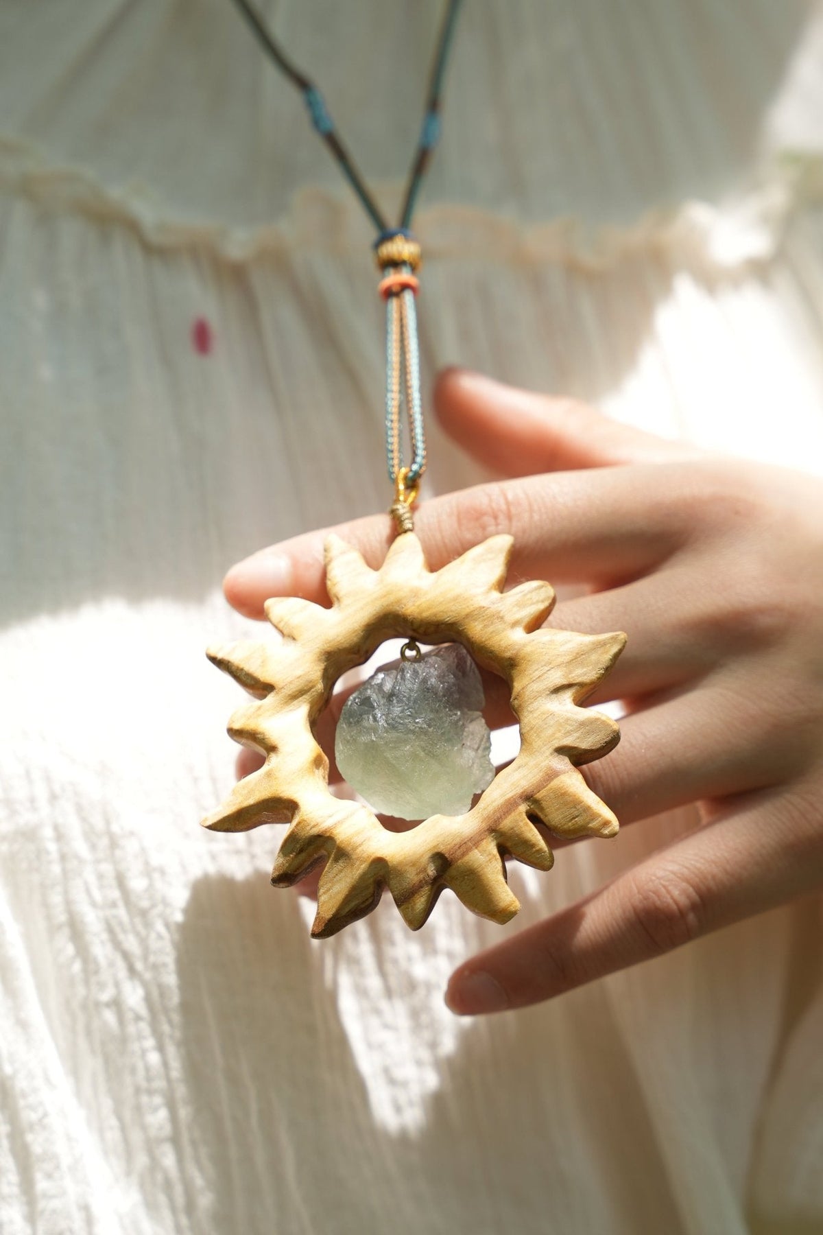 "The Solar Crystal" - Hand-Carved Wood Sun Pendant with Raw Floating Gemstone