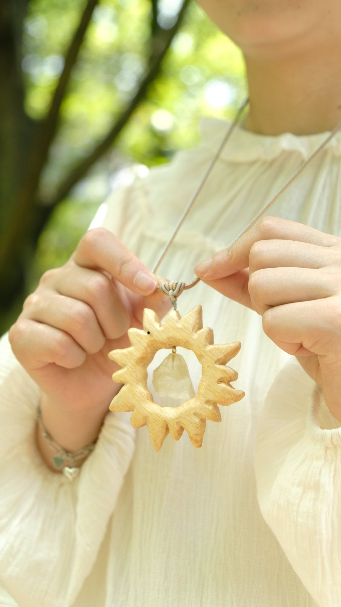 "The Solar Crystal" - Hand-Carved Wood Sun Pendant with Raw Floating Gemstone