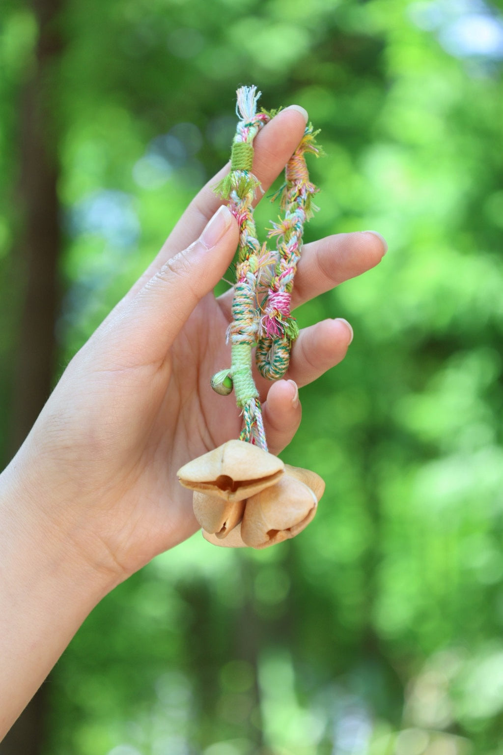 "The Spring Whisper" - Pastel Hand-Woven Bracelet with Nut Shell Bells