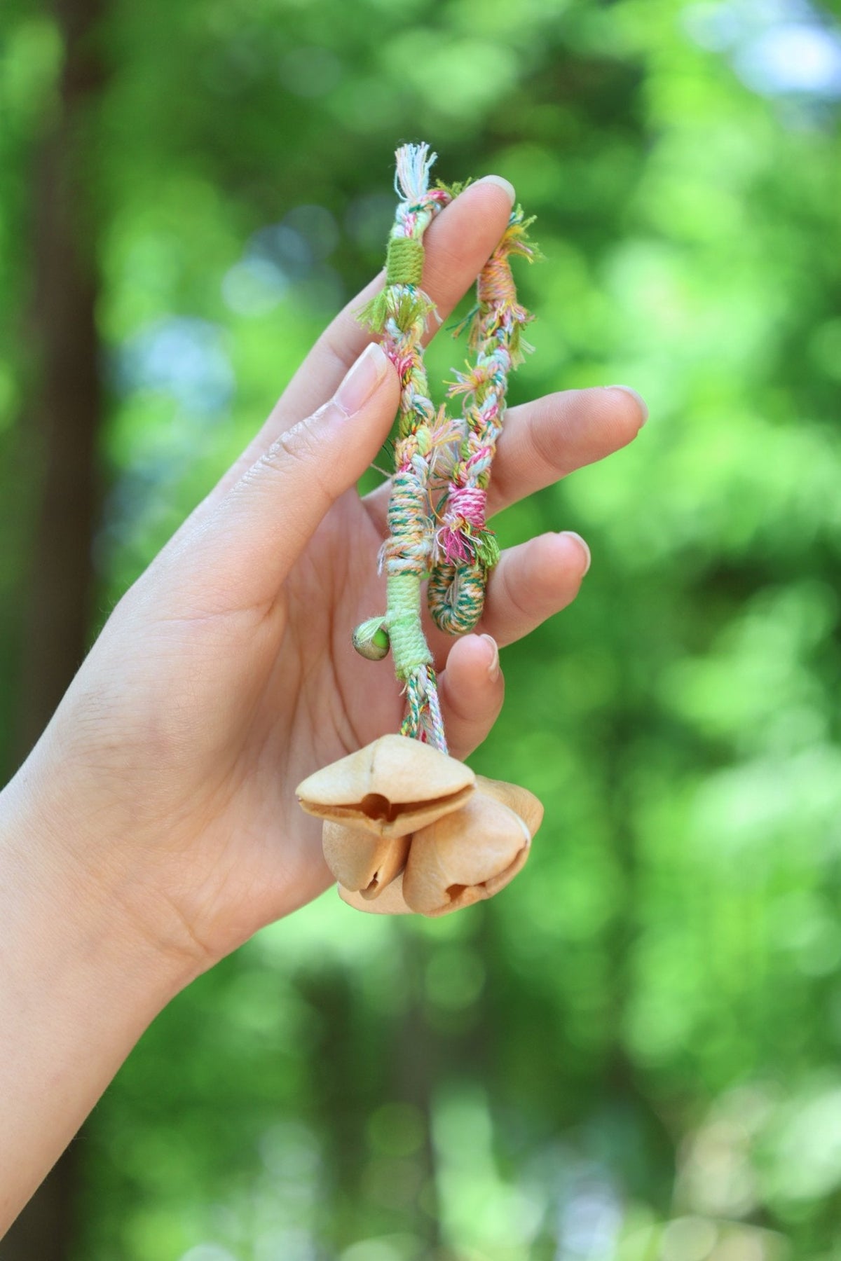 "The Spring Whisper" - Pastel Hand-Woven Bracelet with Nut Shell Bells
