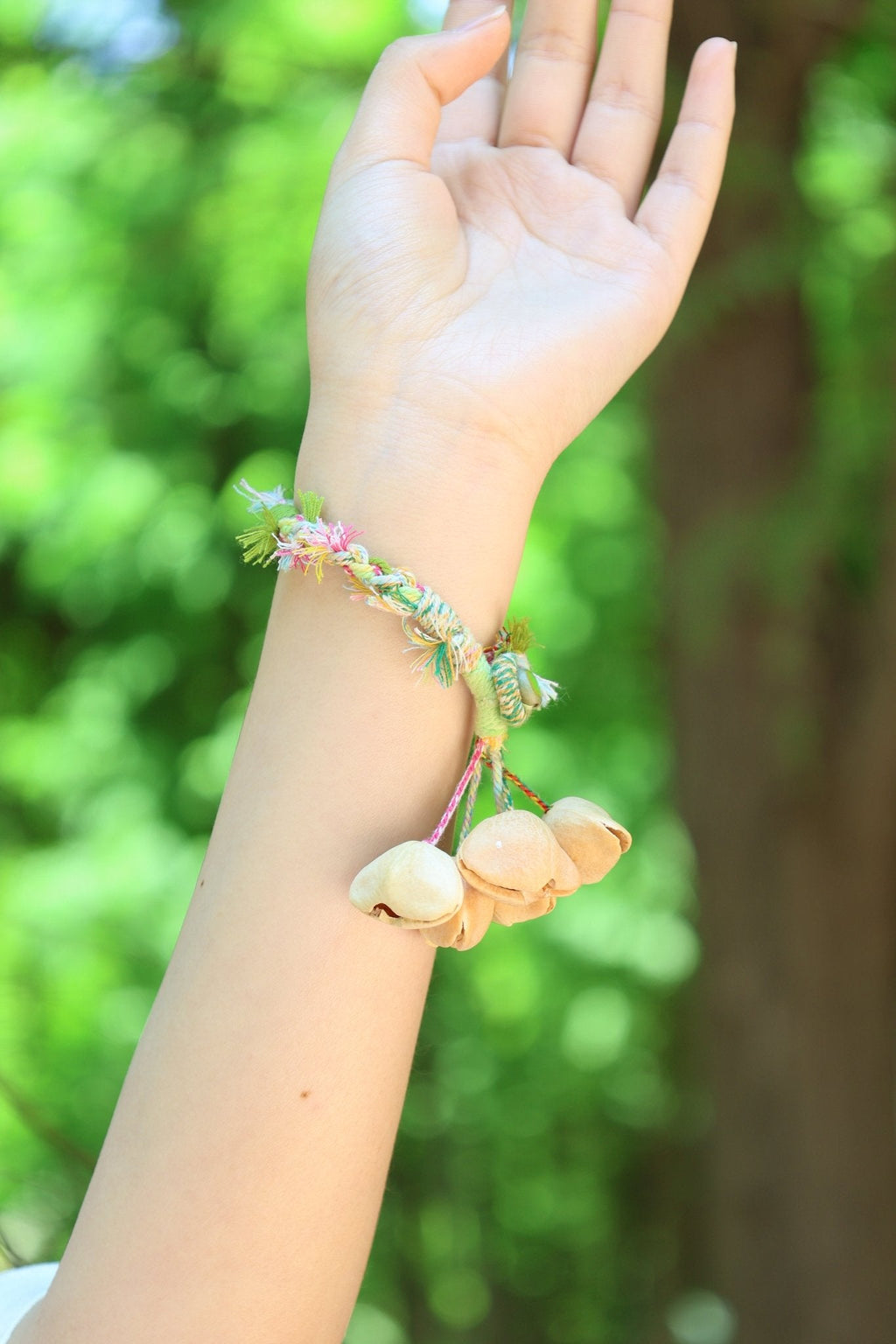 "The Spring Whisper" - Pastel Hand-Woven Bracelet with Nut Shell Bells