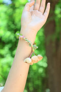 "The Spring Whisper" - Pastel Hand-Woven Bracelet with Nut Shell Bells
