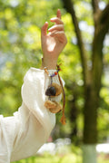 "The Tribal Rhythm" - Hand-Woven Macrame Bracelet with Singing Seed Pods