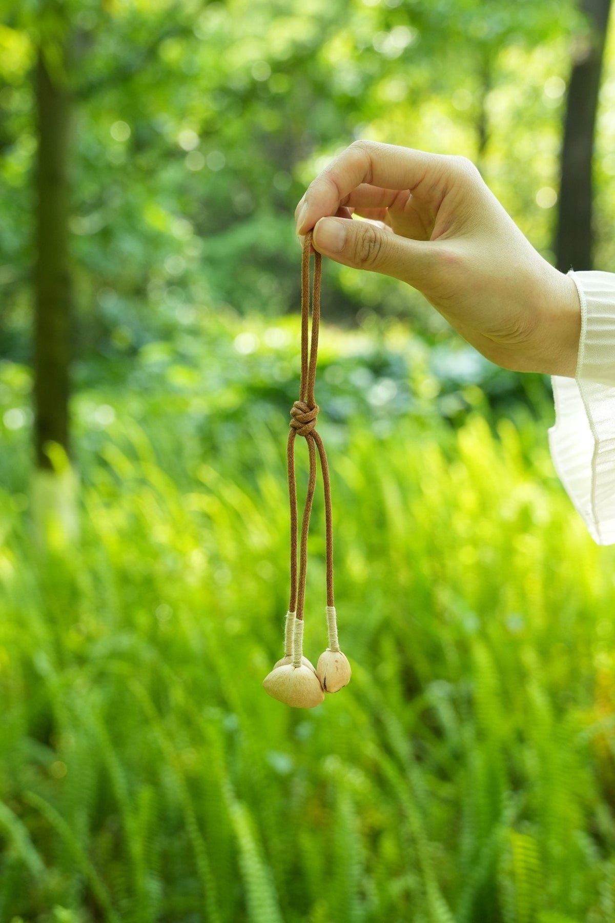 "The Twin Seeds" - Minimalist Suede Cord Strap with Natural Heart Pods
