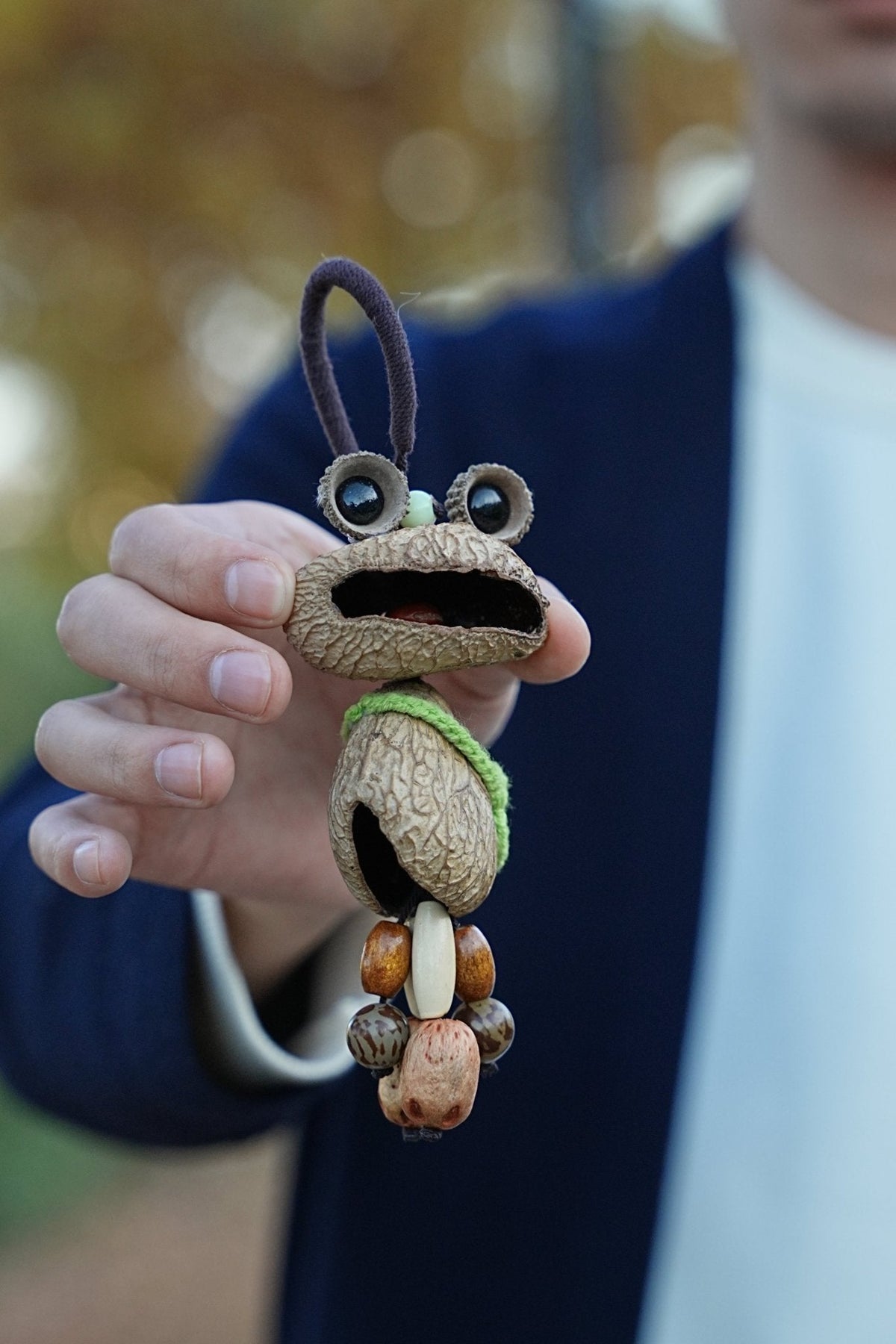 "The Wandering Frog" - Funny Big-Mouth Nut Shell Charm with Mini Knit Bag