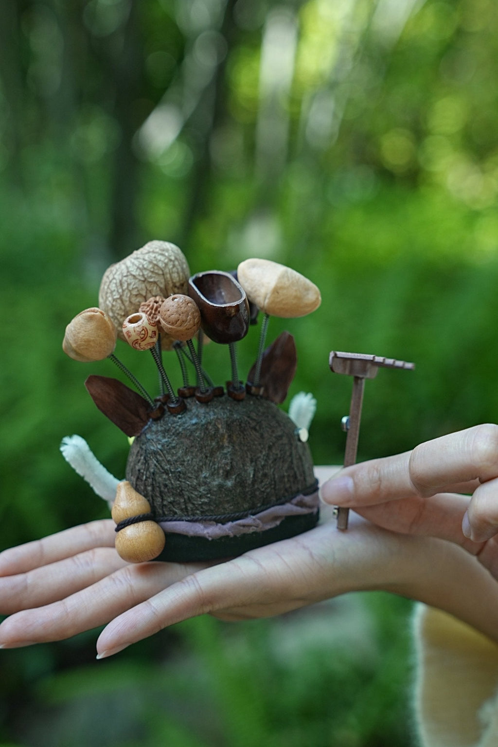 "The Wild Guardian" - Nut Shell Boar Doll with Rake & White Tusks