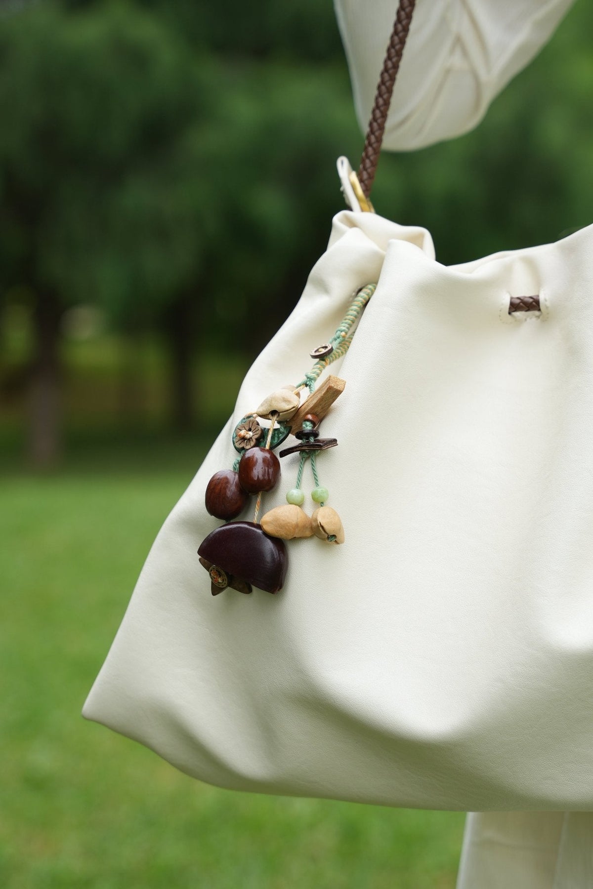 "The Woodland Whisper" - Sage Green Macrame & Natural Seed Bag Charm